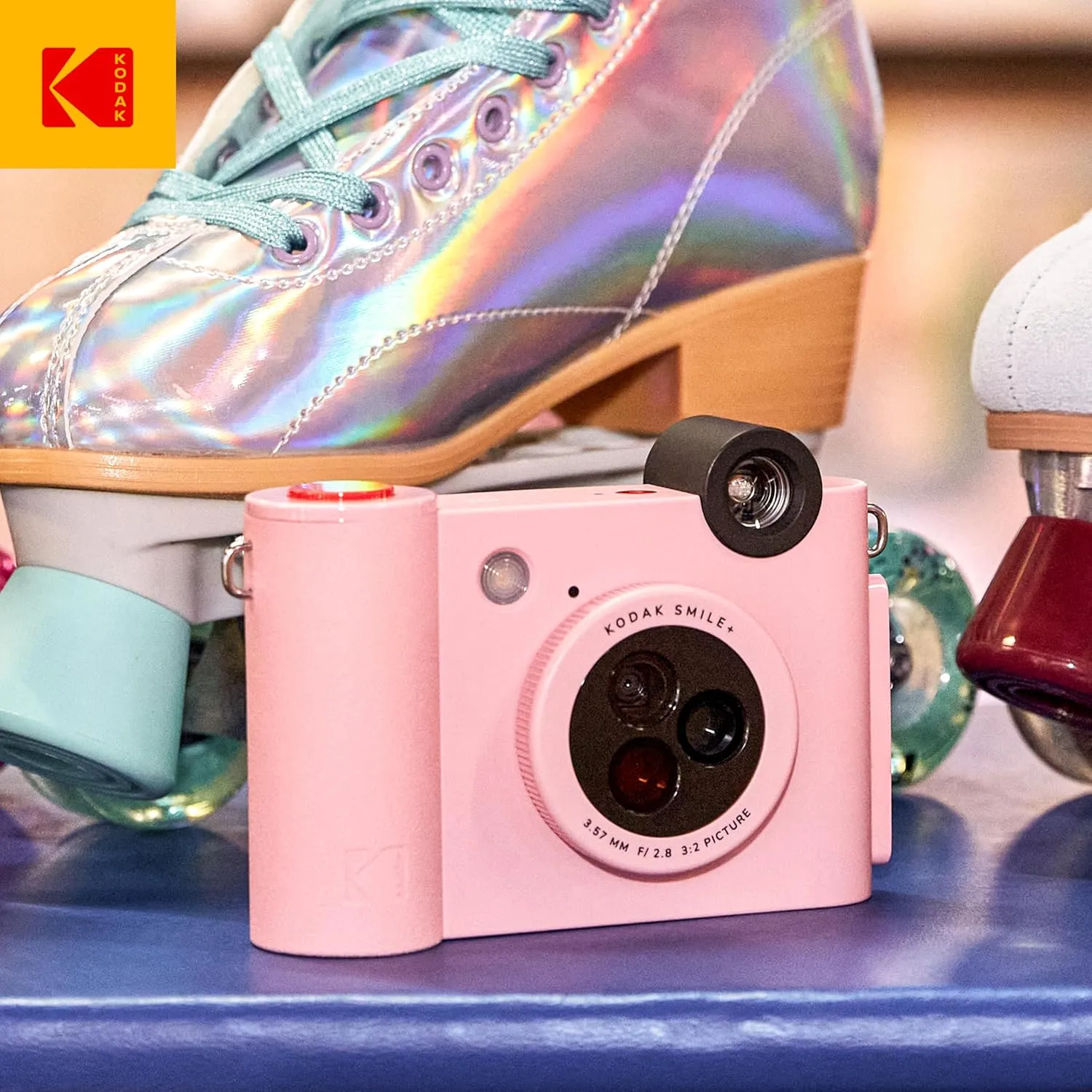 KODAK Smile  2-in-1 Digital Instant Print Camera & Wireless Bluetooth Photo Printer - 10MP, Special-Effect Rotating Lens, Zink 2x3” Sticky-Back Photos, Print via Fun App from Smart Devices - Pink